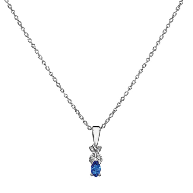 round cut tanzanite and diamond drop pendant sterling silver